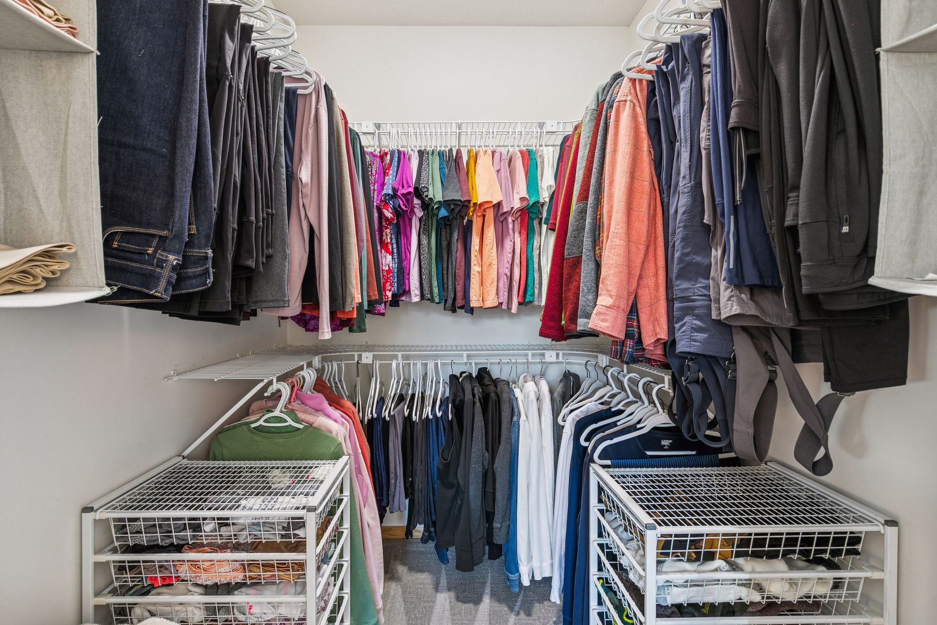 Large walkin closet with shelving